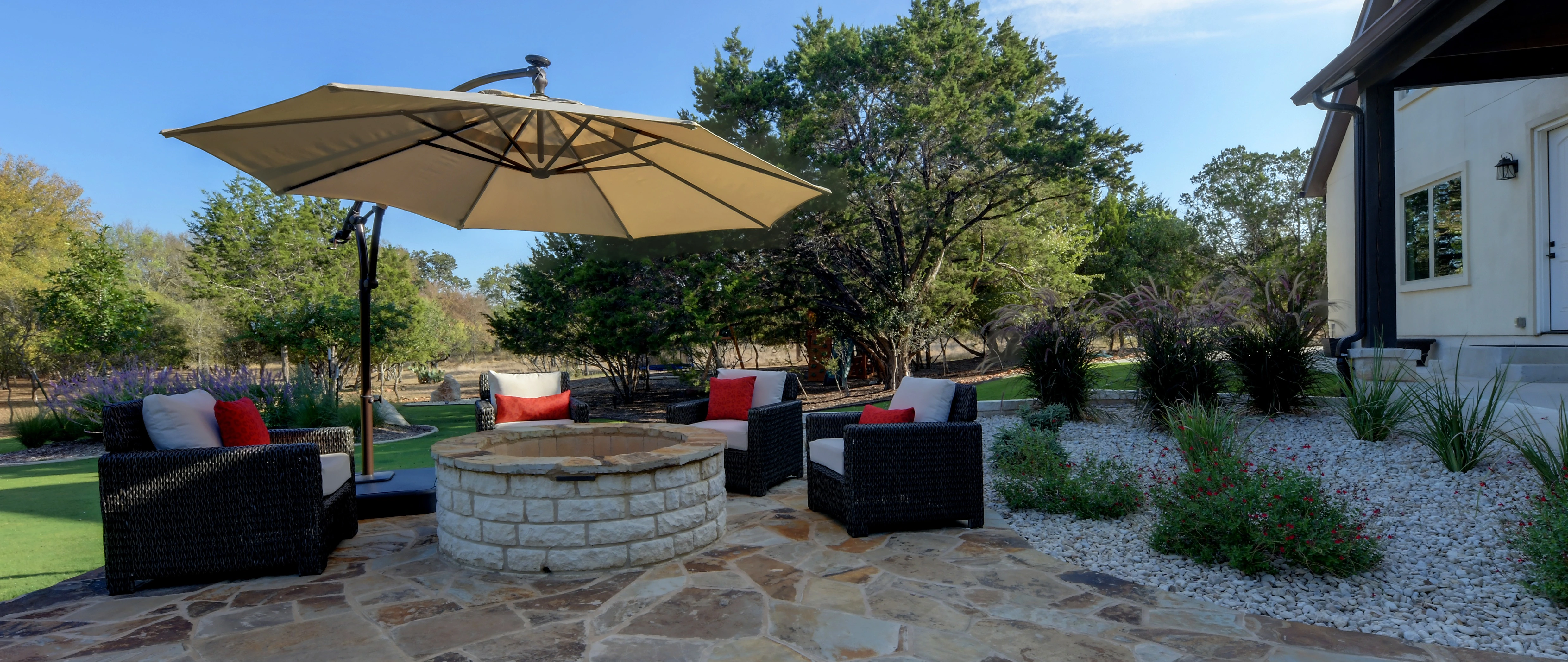 Wood-burning fire pit on a patio in Garden Ridge, TX.