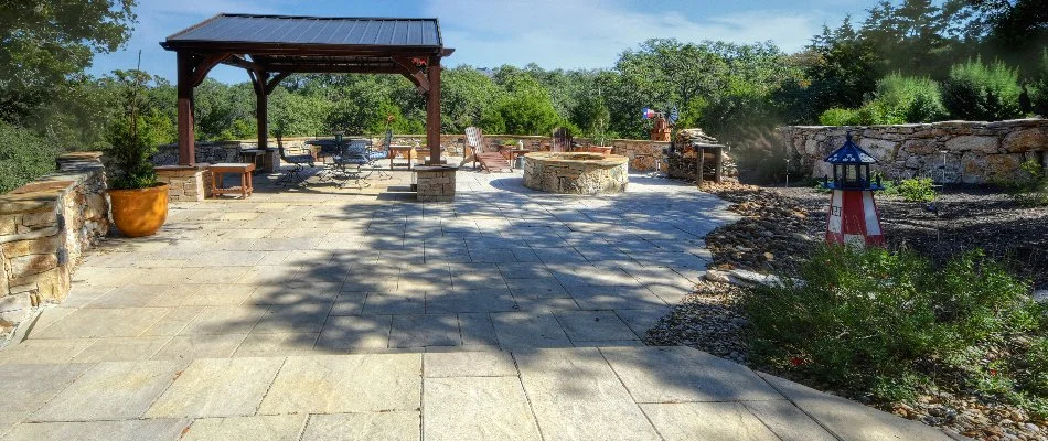 Round patio and green plants in New Braunfels, TX.